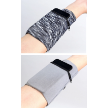 Fabric armband on the arm for running fitness, camo blue