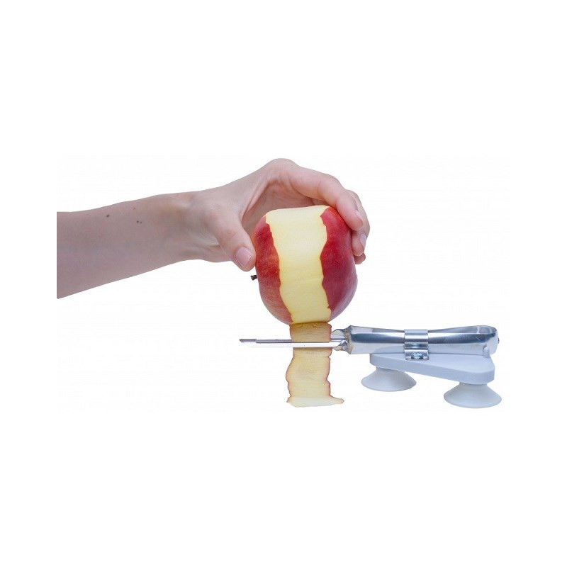 Suction cup mounted fruit and vegetable peeler